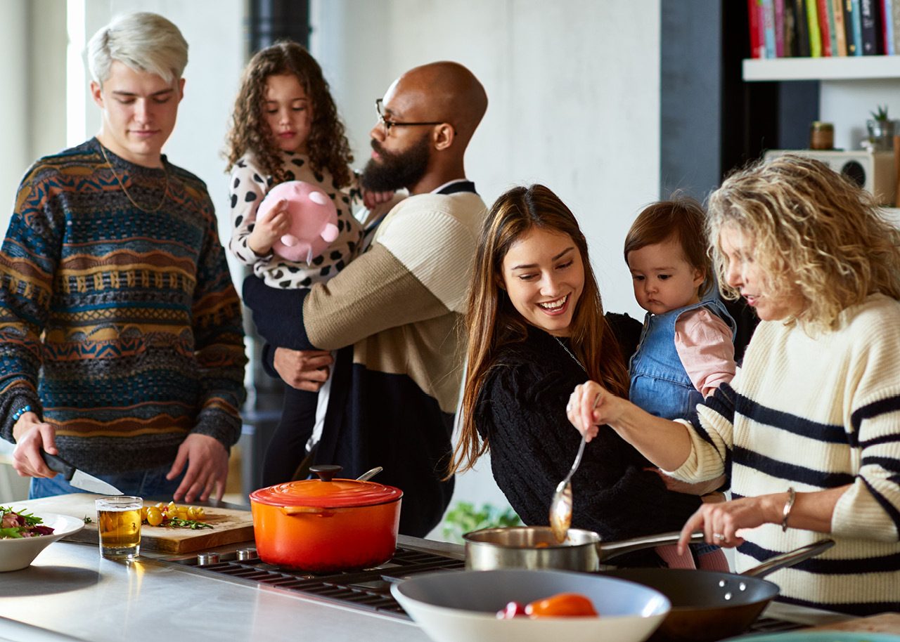 Family gathered around kitchen island